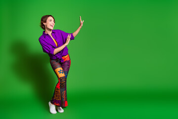 Photo portrait of old vintage outfit woman in purple stylish shirt trendy pants with good mood...