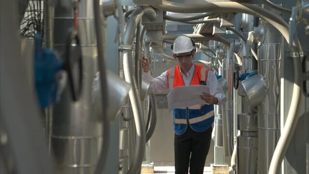 Engineers inspect the completed air conditioning and water systems to continue verifying their functionality.