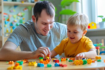 Fototapeta premium father and son playing blocks