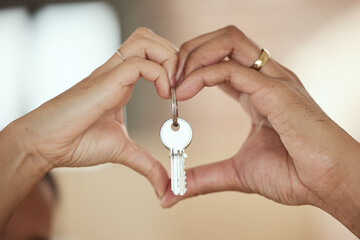 Couple, heart and hands with keys for new home, investment and marriage in love for growth, care...