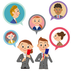 携帯電話で連絡をしている会社員