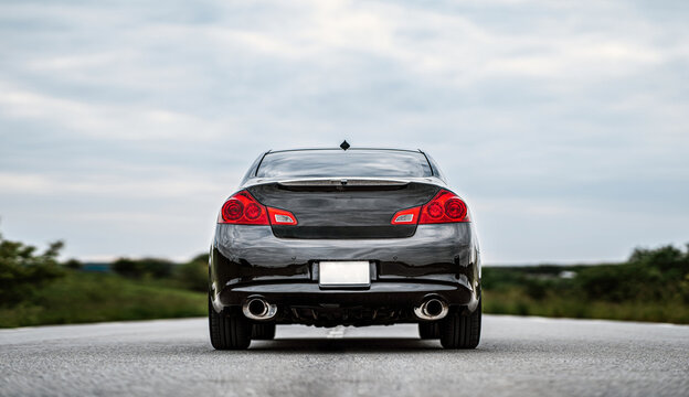 Black sport car on the road