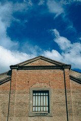 Obraz premium Church exterior with blue sky and clouds
