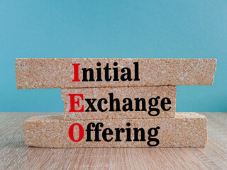 IEO initial exchange offering symbol. Concept words IEO initial exchange offering on brick blocks....