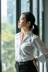 A woman contemplating the city from a high-rise window Fictional Character Created By Generative AI. 