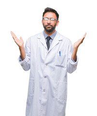 Adult hispanic scientist or doctor man wearing white coat over isolated background clueless and...