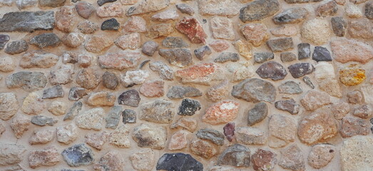 Multicolored Natural Stone Wall Close-Up Texture