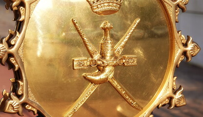 Regal Gold Shield with Emblematic Sword and Crown. A Symbol of Royalty and Chivalry in Gleaming...