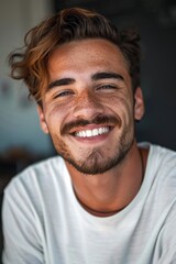 Obraz premium Smiling Young Man in Turtle Neck Sweater