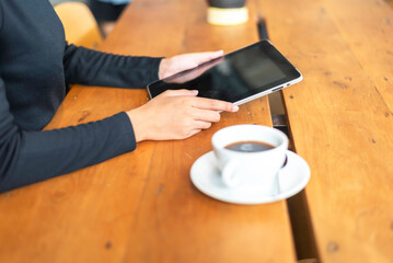 Young thoughtful Asian business woman working in modern office, taking notes and thinking of professional plan, project and working.successful lady.