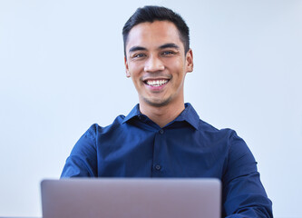 Businessman, portrait and office with laptop, smile and confidence for intern goals. Creative...