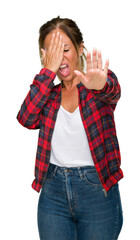 Middle age adult woman wearing casual jacket over isolated background covering eyes with hands and doing stop gesture with sad and fear expression. Embarrassed and negative concept.