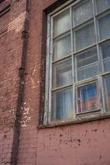 The window of an old, abandoned factory