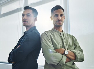 Fototapeta premium Confident, men and portrait in office for success, management and serious in workplace. Crossed arms, startup and partners in company for ambition, teamwork or together with pride for achievement