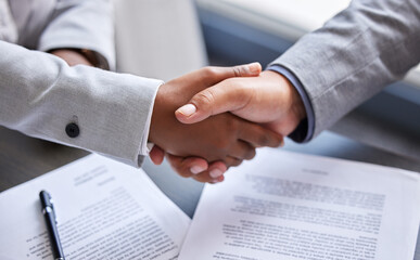 Closeup, deal and handshake for contract, agreement and success for broker in business office....