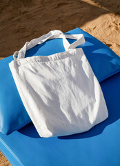 blank shopper handbag mockup on lounge on sandy beach