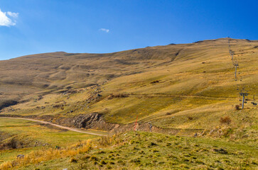 Obraz premium ropeway and slopes of Tsaghkadzor Ski Resort on Mount Teghenis (Kotayk province, Armenia)