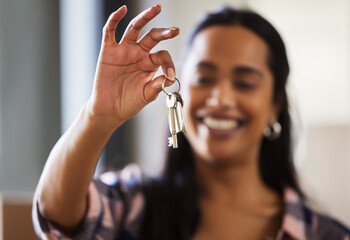 New house, blur or hand of woman with keys for real estate, property investment or buying apartment. Home goal, achievement and happy female person with pride or smile to celebrate moving in flat