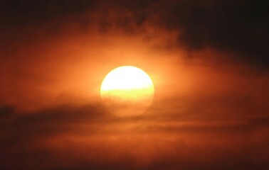 The sun is set  and the clouds on the evening moody orange sky,  amazing nature picture