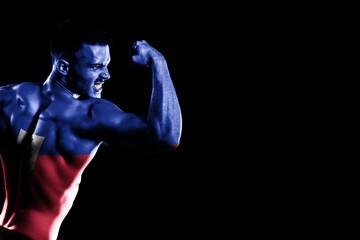 Haiti flag handsome young muscular man black background