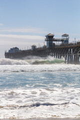 the iconic pier at the beautiful beach of Oceanside in summer, california