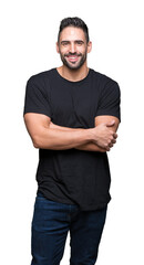 Young handsome man over isolated background happy face smiling with crossed arms looking at the camera. Positive person.