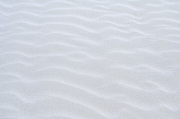 White sand background, macro close up of white sand .relax place for holiday.