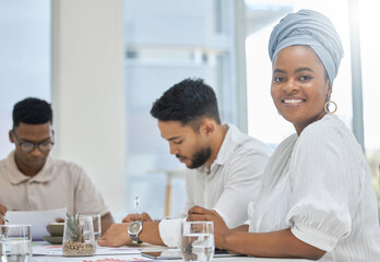Fototapeta premium Business people, documents and portrait of black woman with team in office meeting for savings, planning or budget review. Economy, accounting and African manager with group for revenue analysis