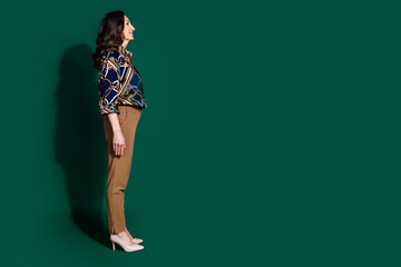 Profile photo of charming stunning pretty lady wear stylish clothes look empty space isolated on dark green color background