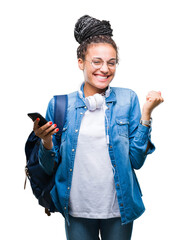 Young braided hair african american student girl using smartphone over isolated background...