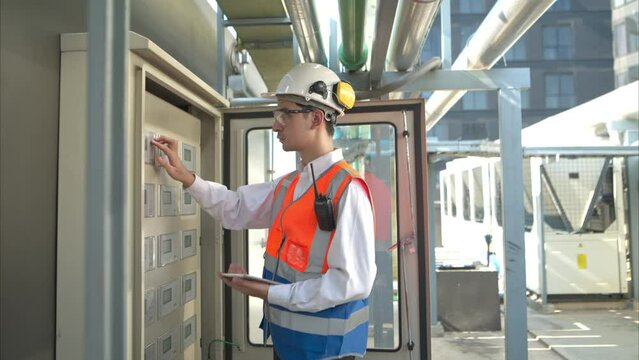 Before proceeding with the testing, Electrical engineer inspects the installed control panel.