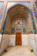 Gate of the Ulugh Beg Madrasah on the Registan Square in Samarkand, Uzbekistan