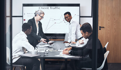 Business people, meeting and presentation in office for collaboration, communication and teamwork. Boardroom, colleagues or partners talking for planning, projections and customer traffic with graph