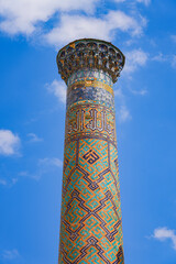 Minaret of the Sher-Dor madrasah on the Registan Square in Samarkand, Uzbekistan