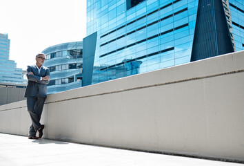 Outdoor, wall and businessman in city thinking of development in property or real estate mockup. Realtor, entrepreneur and man with arms crossed at office building with idea, opportunity or progress