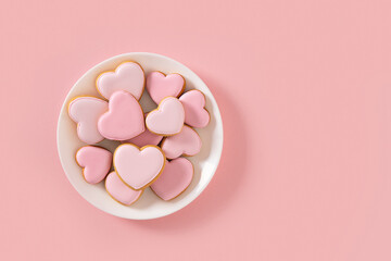 Valentine's Day heart shaped pink glazed cookies.