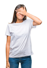 Obraz premium Young asian woman over isolated background smiling and laughing with hand on face covering eyes for surprise. Blind concept.