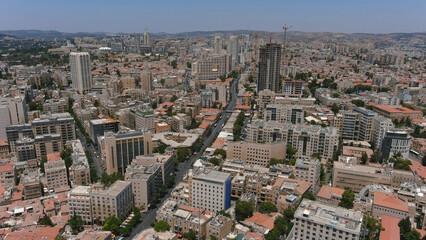 Empty Jerusalem city center aerial, 2022
Drone view from center of Jerusalem no traffic, with red rooftops and tall buildings, may, 2022
