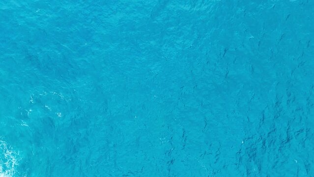 Deep ocean water surface background from above, Aerial top view