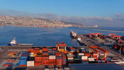 Rows of Shipping Containers on platform, Haifa, aerial

Drone view over cranes and cargo...