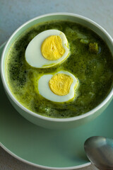 Photo of peruvian green soup. Concept of soups.