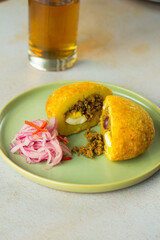 Stuffed potato, typical peruvian dish. Peruvian food concept.
