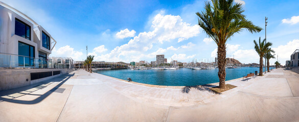Harbor with promenade and view to the boats in Alicante, Spain