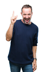 Fototapeta premium Middle age hoary senior man over isolated background pointing finger up with successful idea. Exited and happy. Number one.