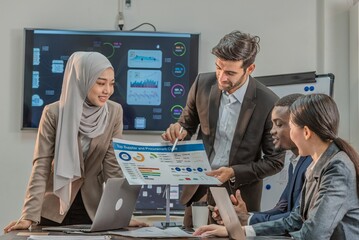 Manager Motivational teamwork officer by present document to colleagues decide. multiethnic...