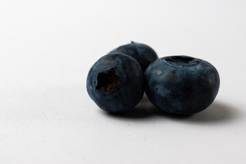 blueberries on a white