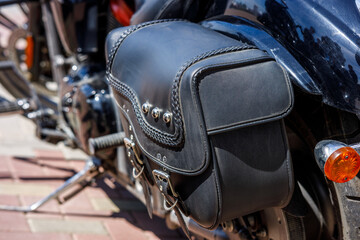 black leather trunk on a motorcycle