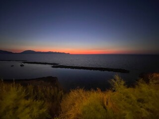 sunset over the river .Sicilia 