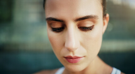 Woman, face and thinking in outdoor for goal, vision or mindset for health, workout or plan. Female person, athlete and closeup on break in exercise or training for fitness, wellness and sports