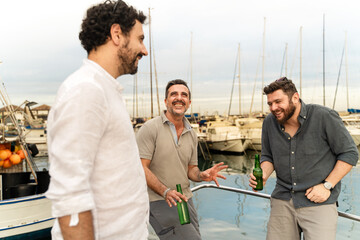 Three Friends Laughing and Socializing at Marina